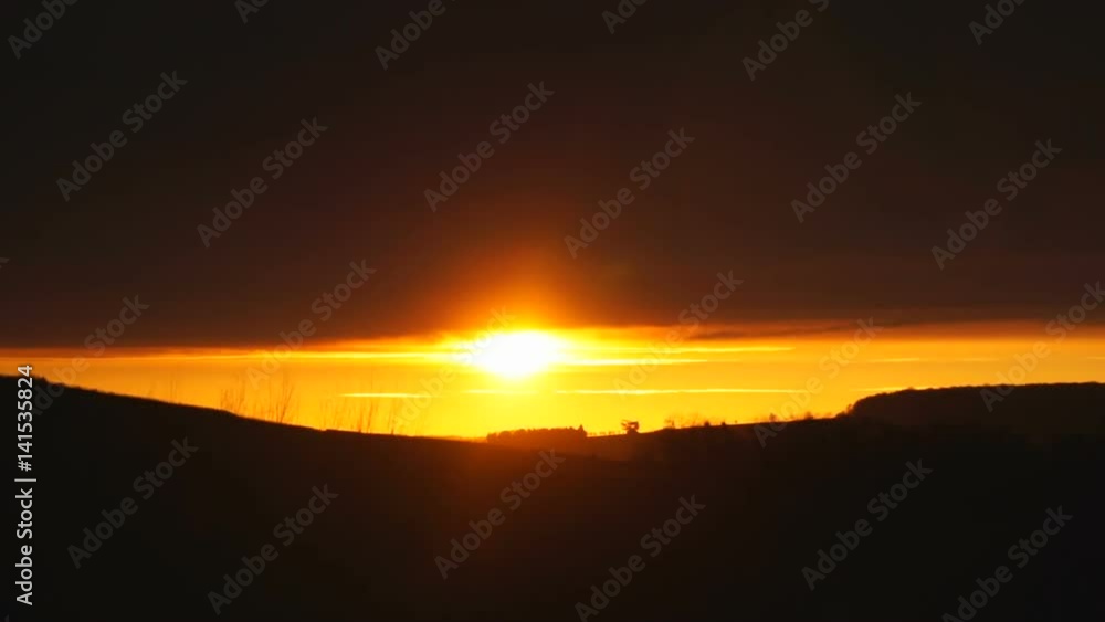 Timelapse, beautiful sunset among the dark clouds Timelapse, beautiful sunset among the dark clouds