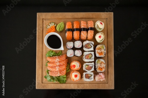 Assorted sushi set served on wooden tray