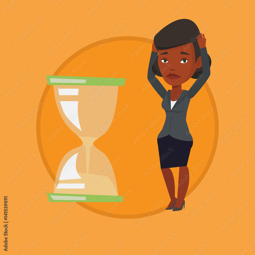 Desperate business woman looking at hourglass. Desperate business woman looking at hourglass.