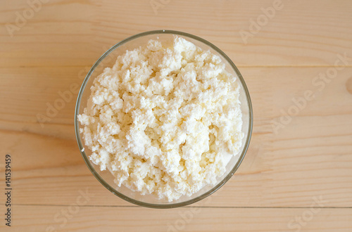 Cottage cheese in a glass plate 