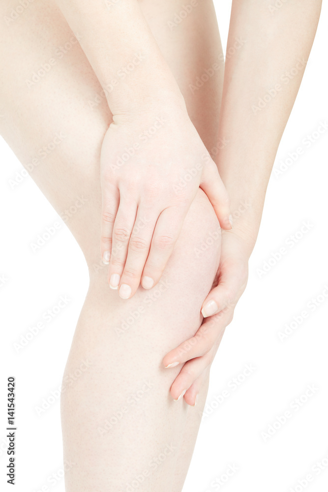 Woman knee pain with hands touching leg on white, clipping path