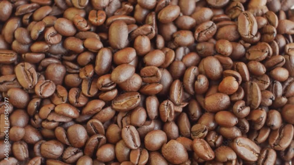 coffee beans on rotating stand closeup, slow motion coffee beans on rotating stand closeup, slow motion