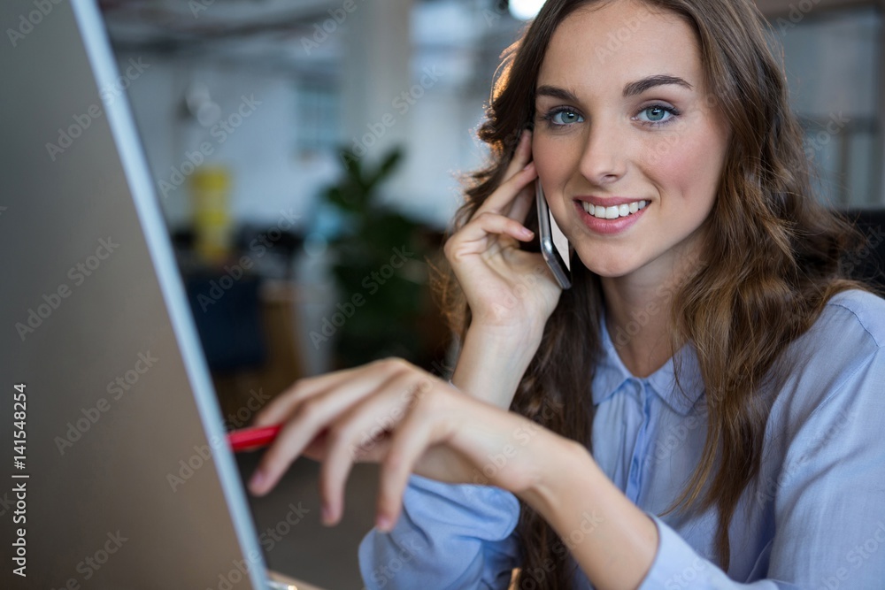 Businesswoman working over computer Businesswoman working over computer