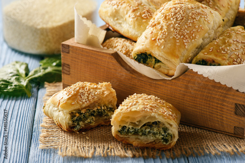 Canvas Print Puff pastry rolls  with spinach and ricotta.