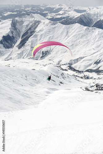 Winter paragliding in Gudauri mountains