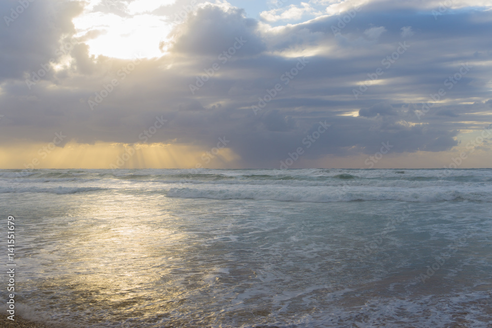 Sea of clouds during dramatic sunrise taken at the edge of the cliff near a viewpoint in the Haifa Israel