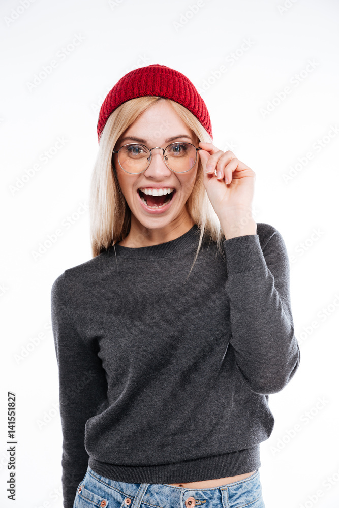 Happy excited woman in hat and glasses looking at camera Happy excited woman in hat and glasses looking at camera