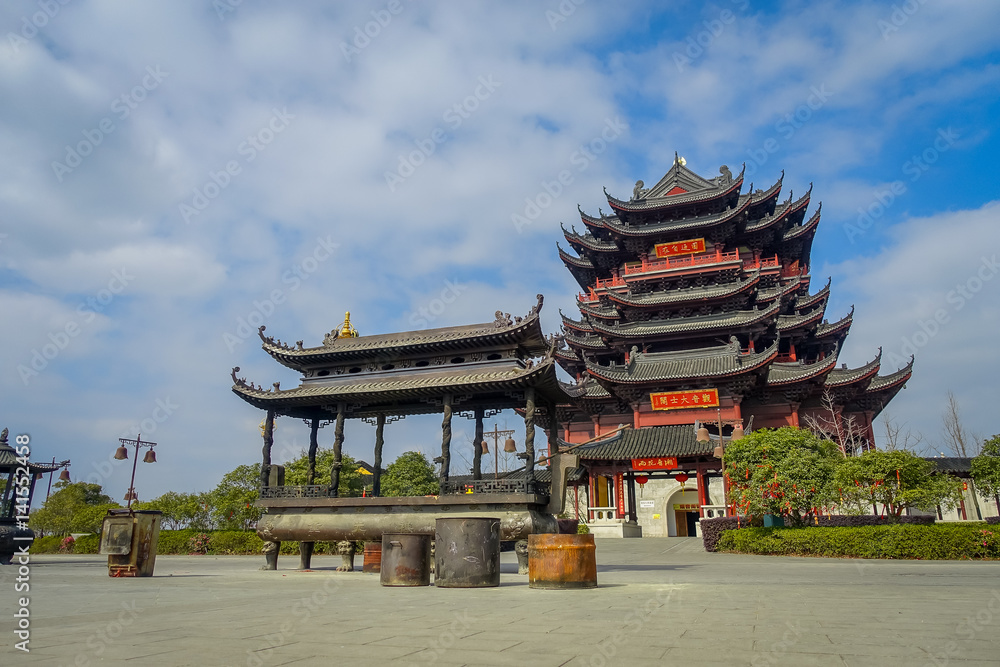 CHONGYUANG TEMPLE, CHINA - 29 JANUARY, 2017: Beautiful red and black tower with stunning chinese architecture, seen from medium distance on a nice sunny day CHONGYUANG TEMPLE, CHINA - 29 JANUARY, 2017: Beautiful red and black tower with stunning chinese architecture, seen from medium distance on a nice sunny day