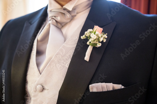 Photography boutonniere in tuxedo