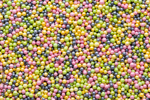 Multicoloured sweet sugar balls. Small ball pattern.