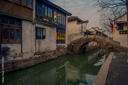 SHANGHAI, CHINA: Famous Zhouzhuang water town, ancient city district with channels and old buildings, charming popular tourist area