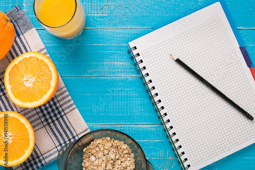 Oatmeal breakfast with orange juice photo