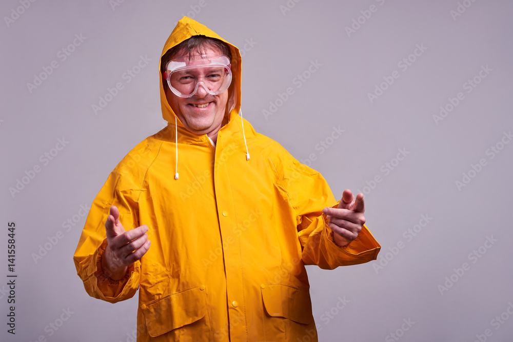Man in yellow raincoat Man in yellow raincoat