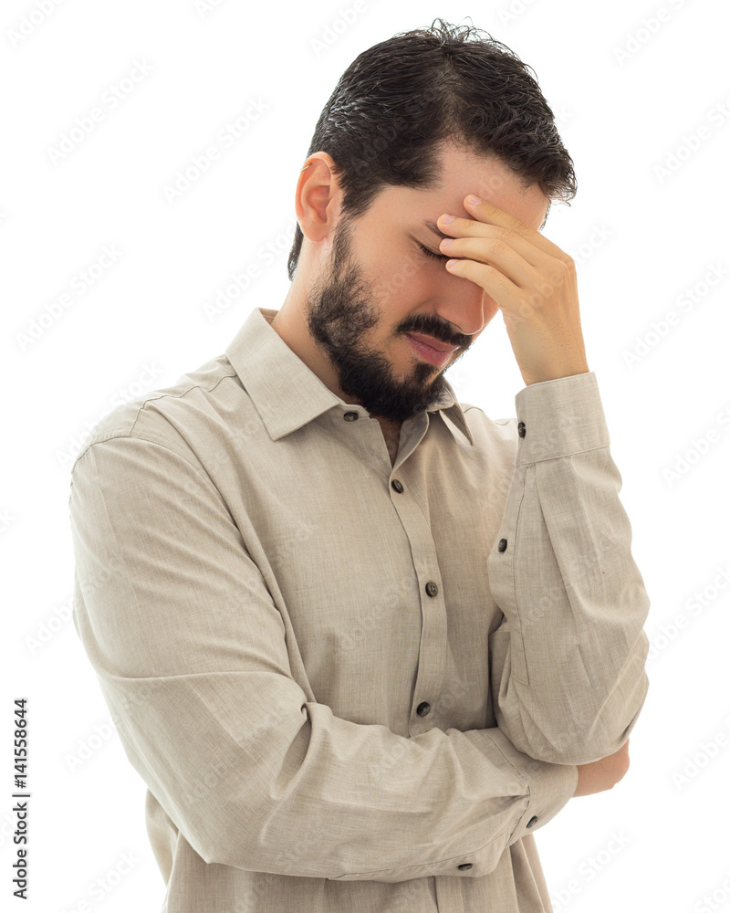 Bearded man with severe headache, worried. White background Bearded man with severe headache, worried. White background