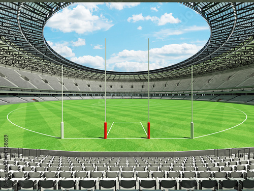 3D render of a round Australian rules football stadium with  white seats and VIP boxes © Danilo