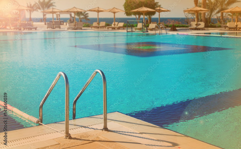Fototapeta premium Summer swimming pool. Sunny weather. Toning and filter