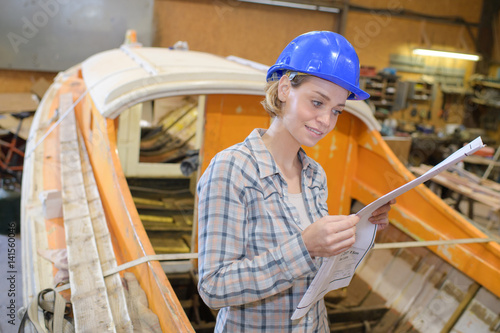 Woman in boatyard photo