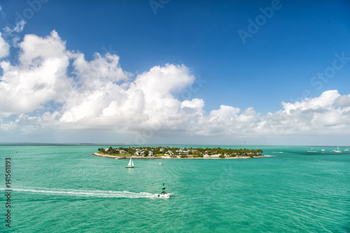 touristic yachts floating by green island at Key West, Florida