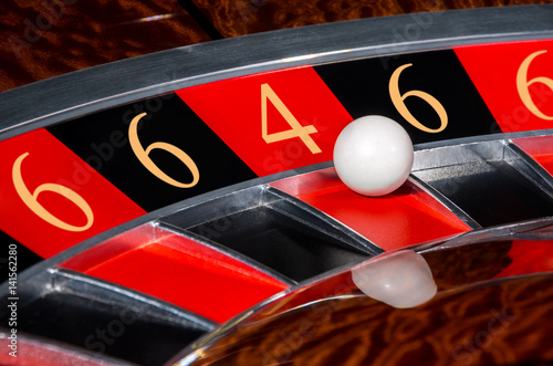 Concept of casino roulette lucky numbers wheel black and red sectors