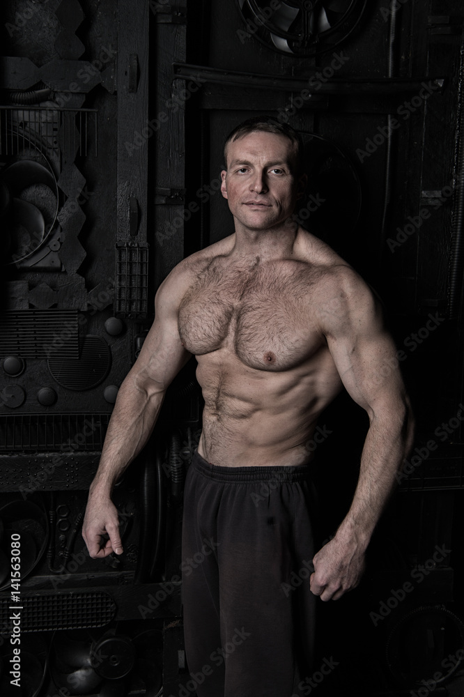 handsome bodybuilder man with muscular body training in gym handsome bodybuilder man with muscular body training in gym