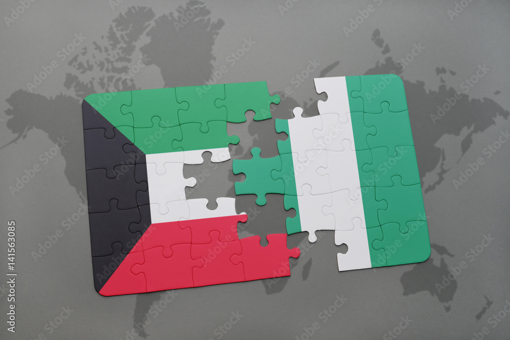 puzzle with the national flag of kuwait and nigeria on a world map ...