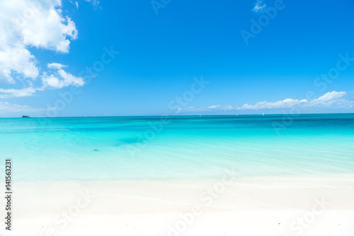 wavy sea  ocean water background on sand coast in Antigua