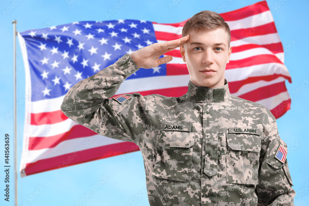 Soldier in camouflage saluting on white background Soldier in camouflage saluting on white background