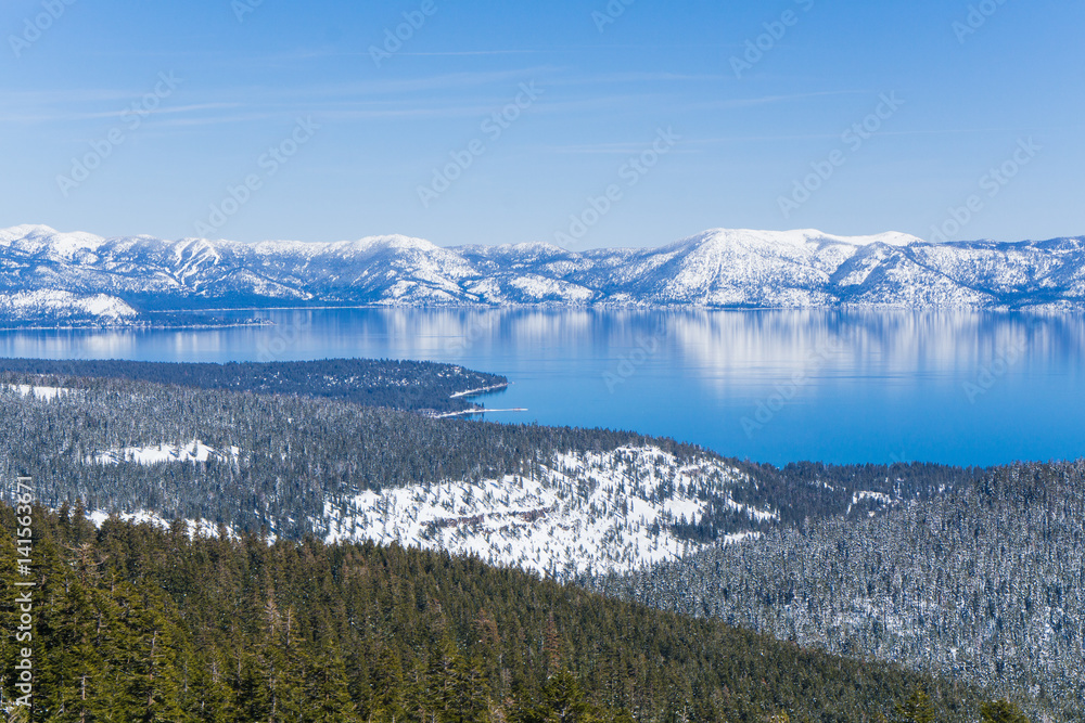 Snow covered slopes of the Sierra Nevada mountains above Lake Tahoe California near a ski resort in winter