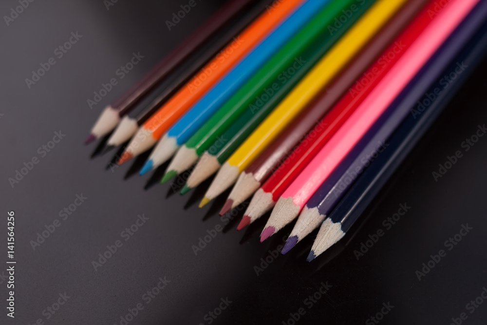 pencils in table Stock Photo | Adobe Stock