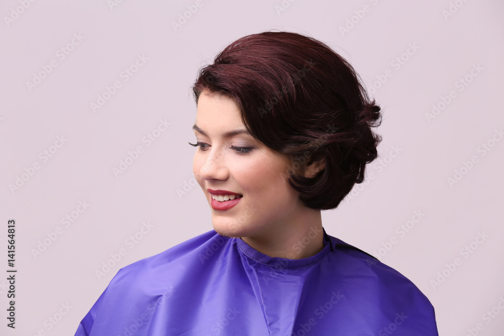 Portrait of young woman with beautiful haircut on color background Portrait of young woman with beautiful haircut on color background