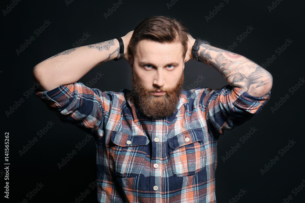 Portrait of handsome bearded man on black background Portrait of handsome bearded man on black background