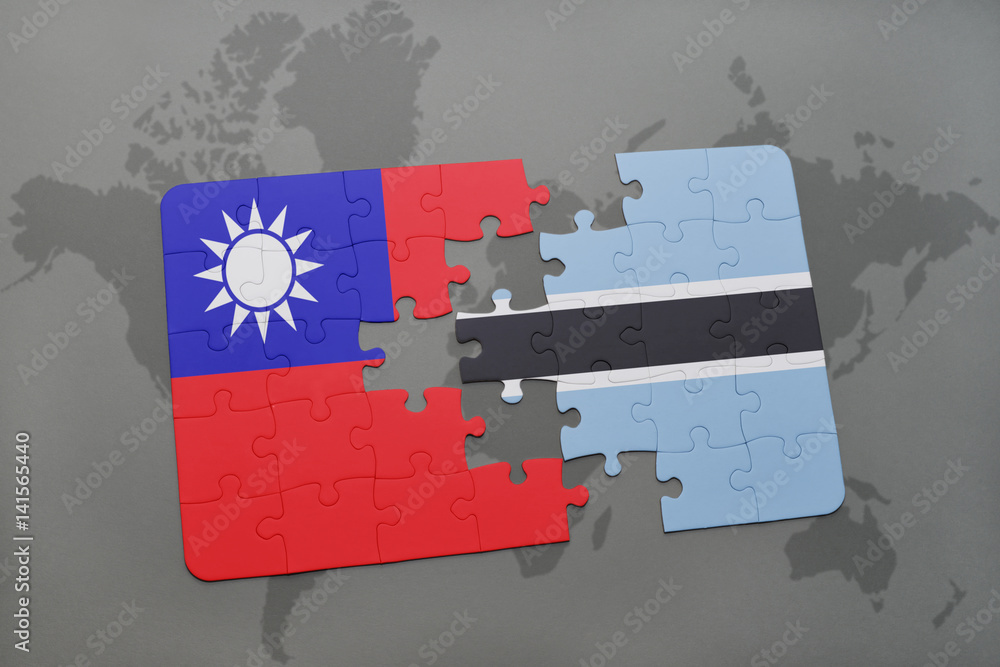Fototapeta premium puzzle with the national flag of taiwan and botswana on a world map