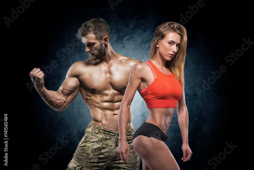Athletic man and woman. Fitness couple.