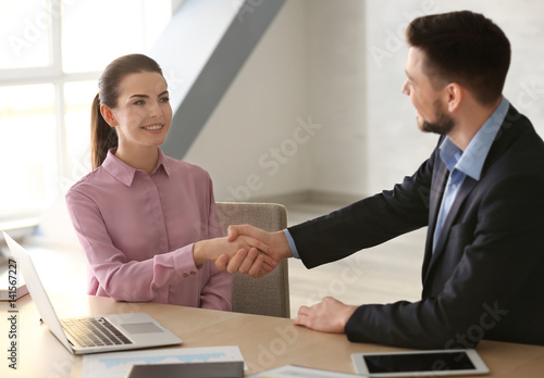 Wallpaper Mural Manager and client shaking hands in office Torontodigital.ca