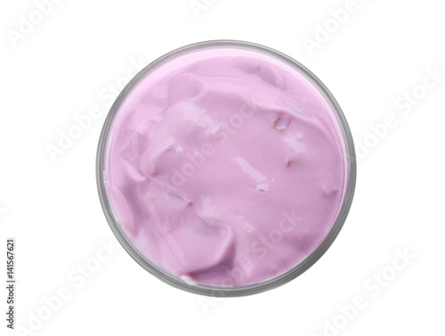 Glass of delicious yogurt on white background