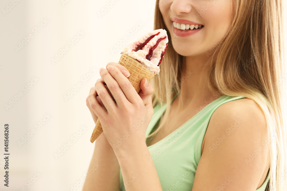 Beautiful young woman with ice cream, closeup Beautiful young woman with ice cream, closeup