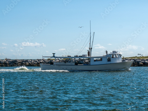 Fishing boat sailing on Gulf of Mexico St George Island Florida