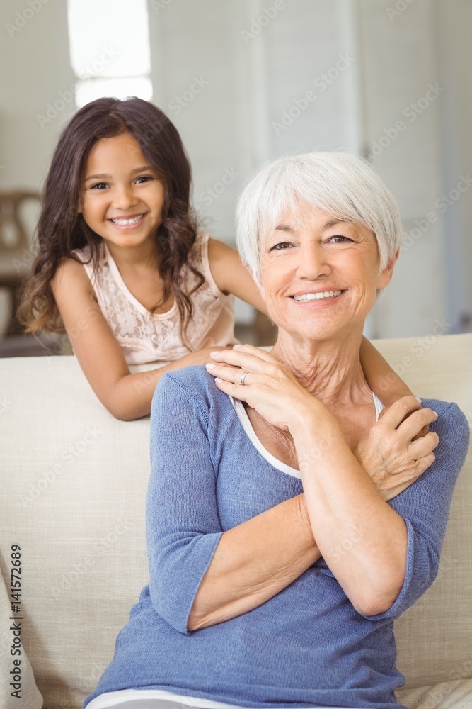  Granddaughter embracing her grandmother 