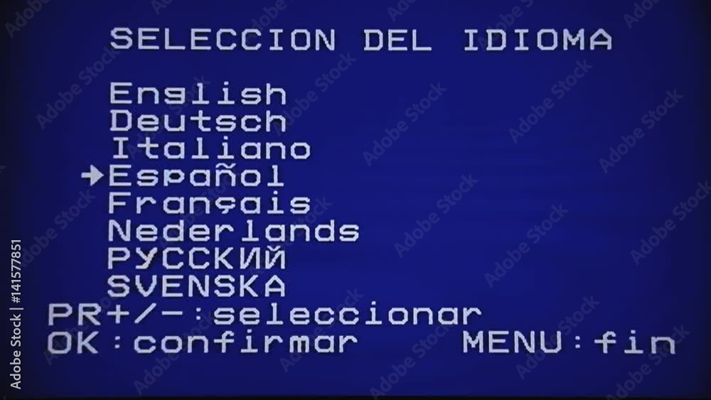 Setting the English language on a VCR VHS player recorder. Other menu