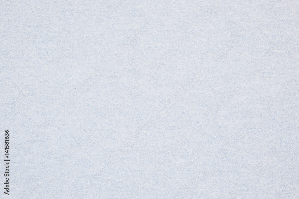 Fototapeta premium Closeup surface paper pattern at the blue paper textured background
