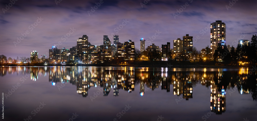 Lost Lagoon Night Panorama. A calm Lost Lagoon in Stanley Park at night. Vancouver, British Columbia.
