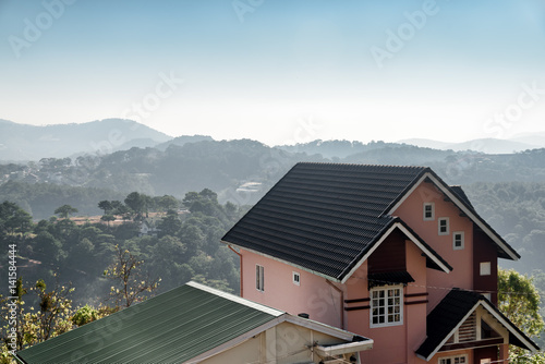 Scenic house among pine woods and mountains, Dalat, Vietnam © efired