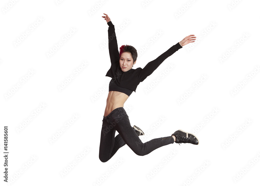 Young casual woman jumping. Isolated