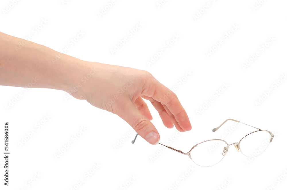 hand of young girl holding glasses. hand of young girl holding glasses.