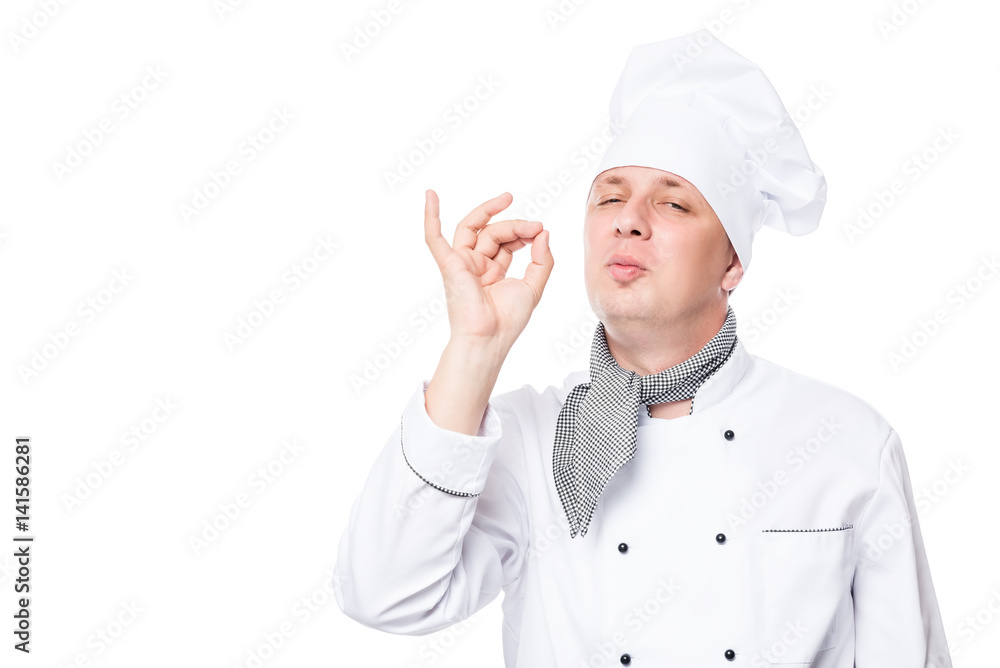 Male chef showing gesture delicious, on a white background Male chef showing gesture delicious, on a white background
