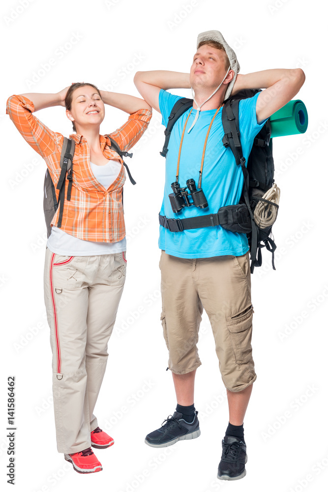 relaxing couple of tourists with backpacks on a white background relaxing couple of tourists with backpacks on a white background