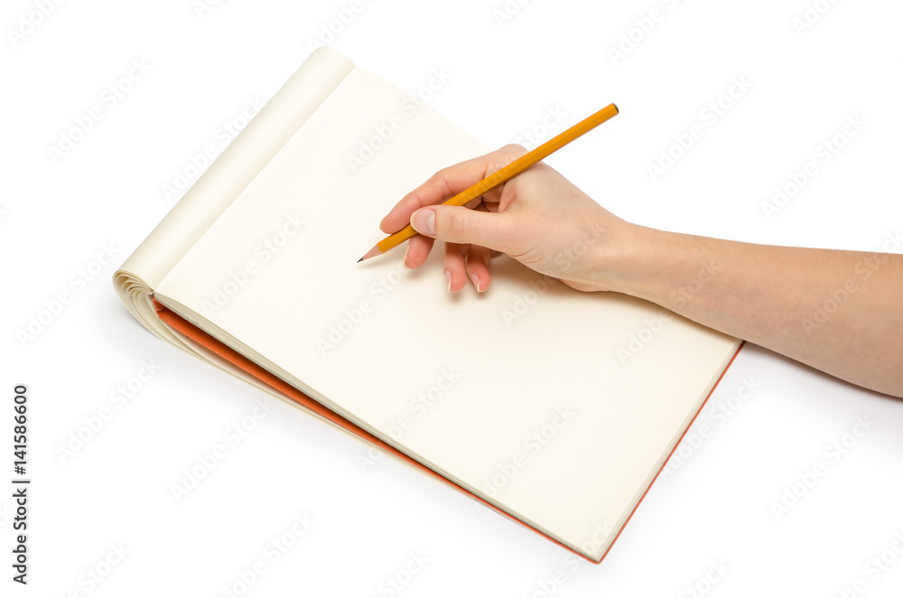 hand of young girl holding notepad. hand of young girl holding notepad.