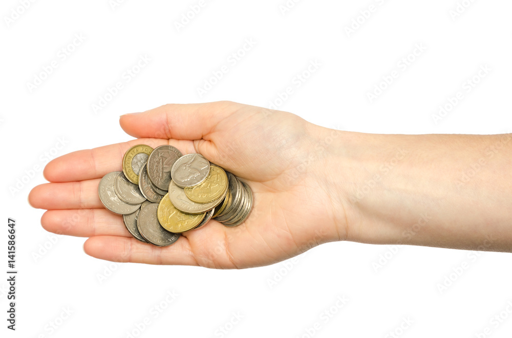 hand of young girl holding coins. hand of young girl holding coins.