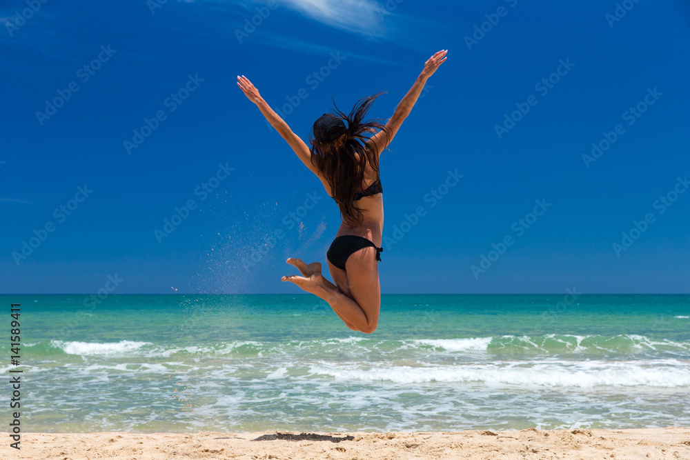 woman relaxes on beach woman relaxes on beach