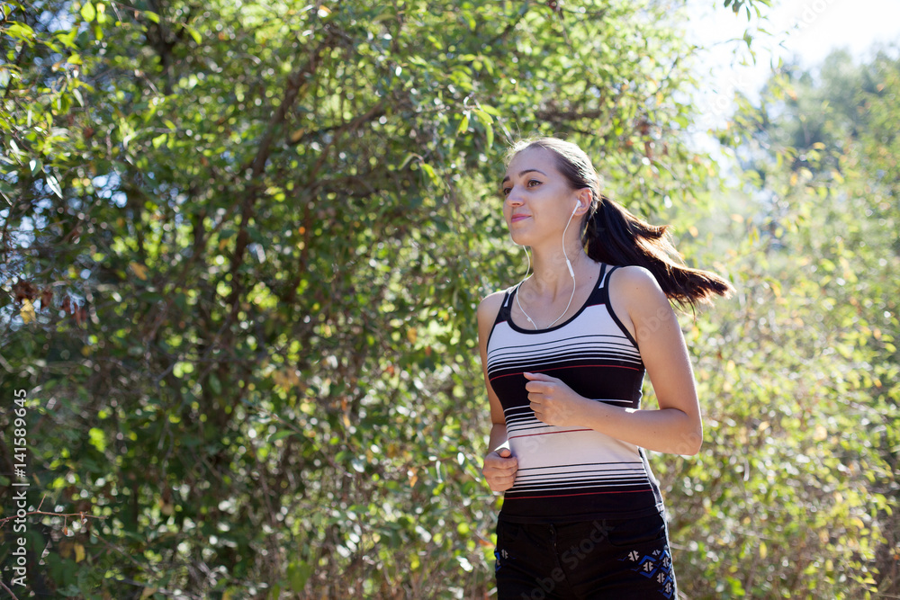 girl goes in for sports runs in forest girl goes in for sports runs in forest